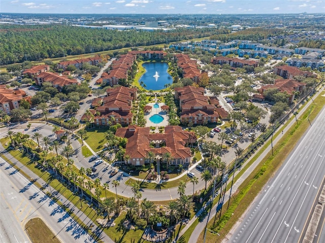 bird's eye view with a water view