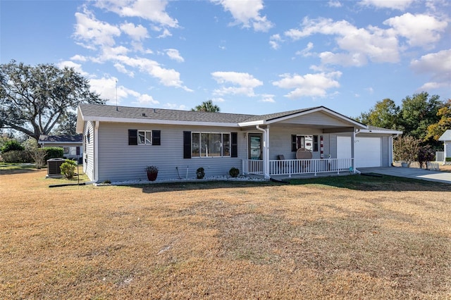 ranch-style home featuring central AC, a front lawn, covered porch, and a garage