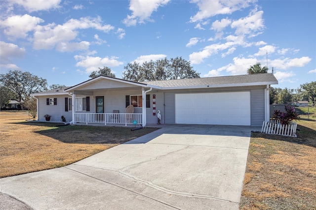 single story home featuring a front lawn, a porch, and a garage