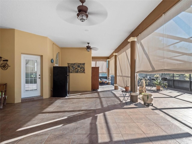 view of patio with ceiling fan