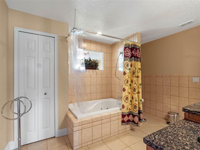 bathroom featuring tile patterned floors, a textured ceiling, and shower / tub combo with curtain