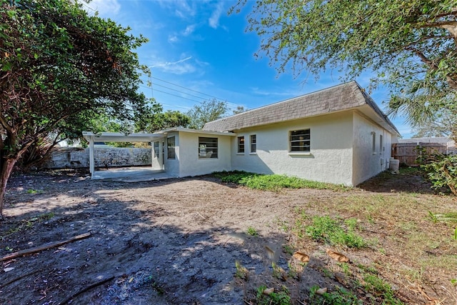 rear view of house with a patio area