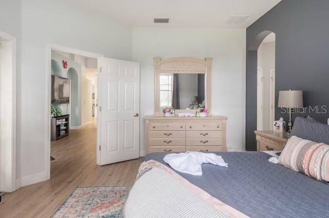 bedroom featuring light hardwood / wood-style flooring