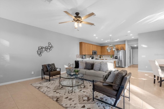 tiled living room featuring ceiling fan