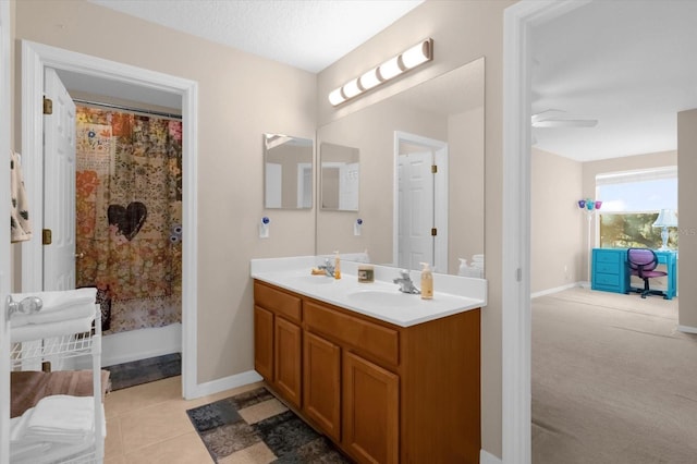 bathroom featuring tile patterned floors, ceiling fan, a shower with shower curtain, and vanity