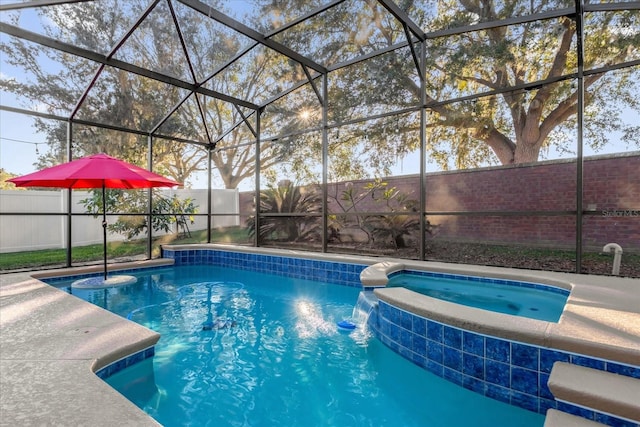 view of swimming pool featuring a lanai, an in ground hot tub, and pool water feature