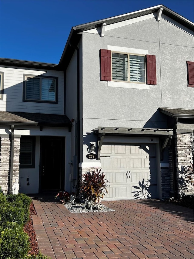 view of front of property featuring a garage