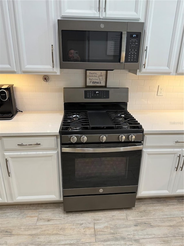 kitchen featuring white cabinetry and stainless steel appliances