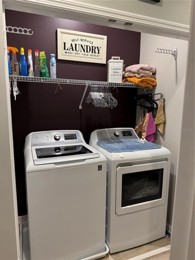 laundry room featuring washer and clothes dryer