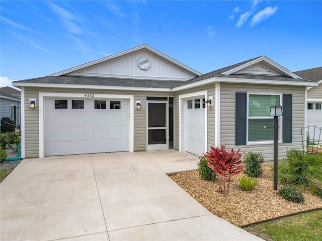 ranch-style house featuring a garage