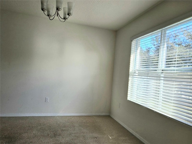 spare room with carpet flooring