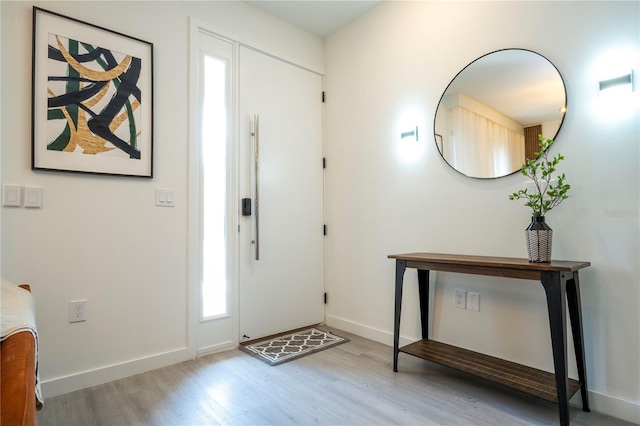 foyer with light hardwood / wood-style flooring