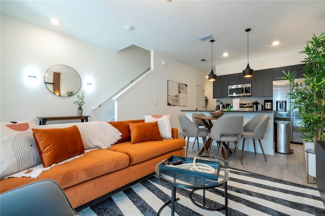 living room with hardwood / wood-style floors