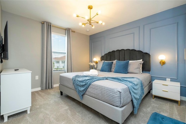 carpeted bedroom with a notable chandelier