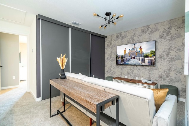 office space with light colored carpet and a chandelier