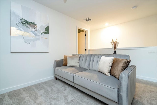 living room with light colored carpet