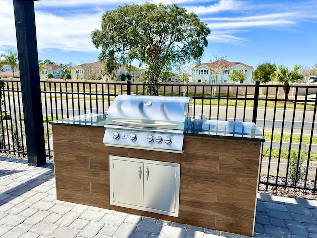 view of patio featuring area for grilling and grilling area