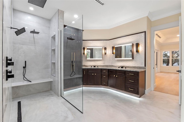 bathroom with backsplash, recessed lighting, crown molding, double vanity, and walk in shower