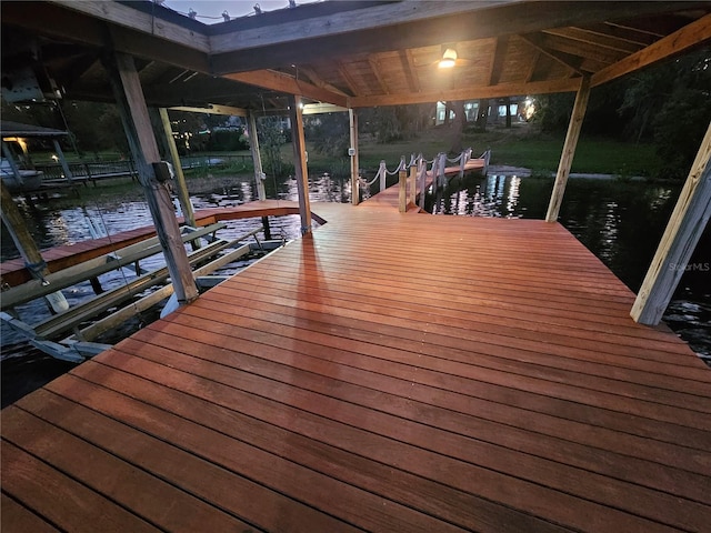 dock area featuring a water view