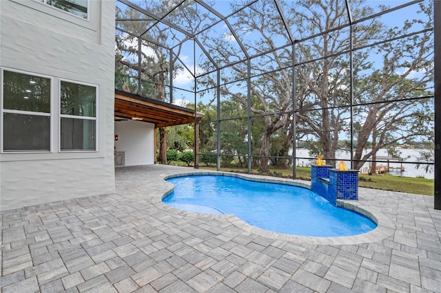 view of pool featuring a lanai and a patio