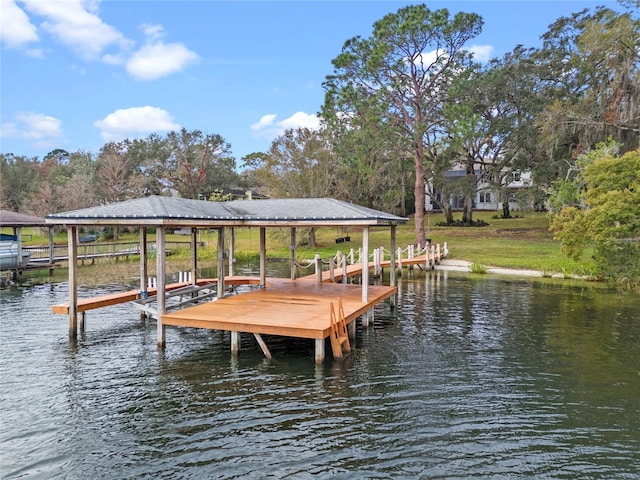 view of dock featuring a water view and boat lift