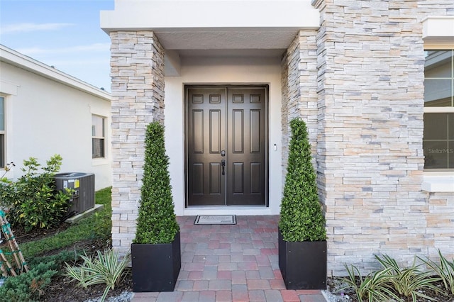 entrance to property with cooling unit