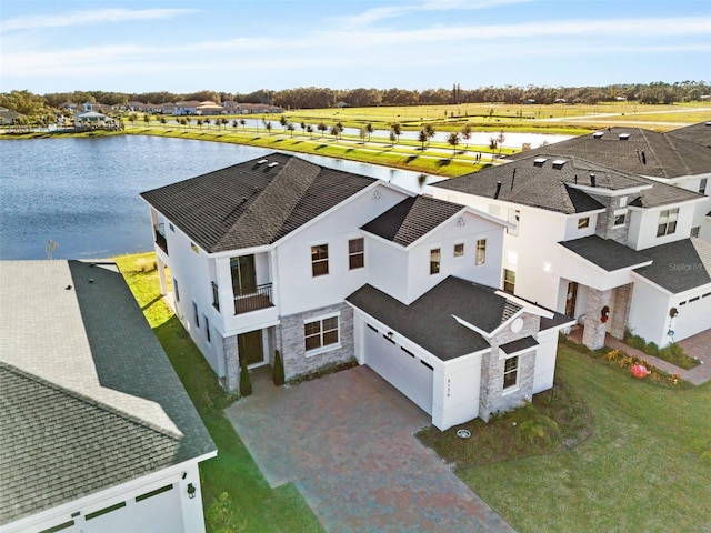 drone / aerial view featuring a water view