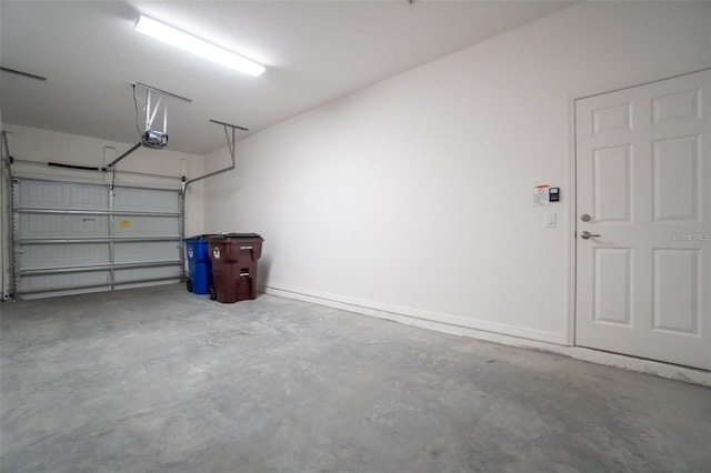 garage featuring a garage door opener