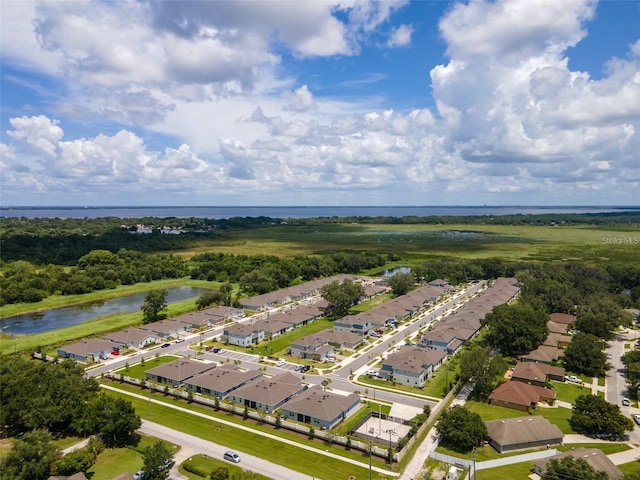 drone / aerial view with a water view