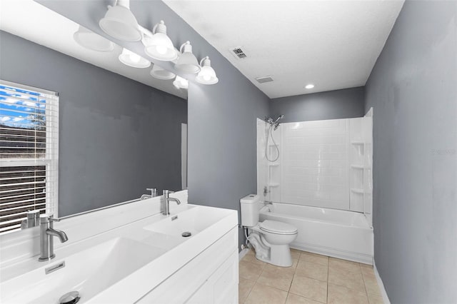 full bathroom with tile patterned flooring, tub / shower combination, a textured ceiling, toilet, and vanity