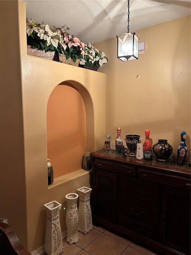 bathroom with tile patterned floors