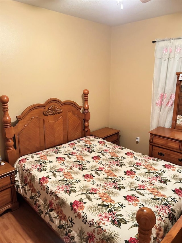 bedroom with light hardwood / wood-style flooring