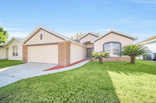 ranch-style home featuring a front lawn and a garage