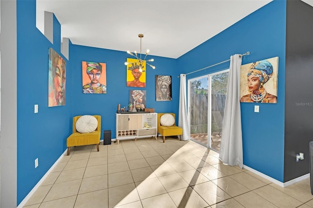 sitting room featuring light tile patterned floors and an inviting chandelier