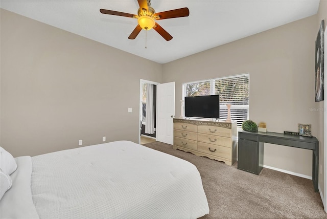 bedroom with dark carpet and ceiling fan