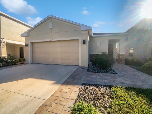 view of front of property featuring a garage