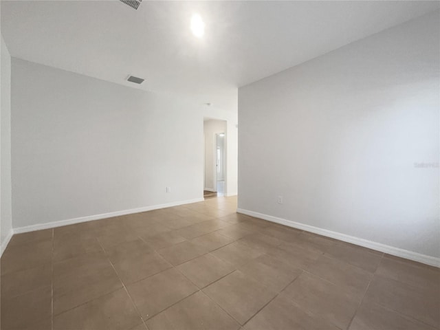 view of tiled spare room