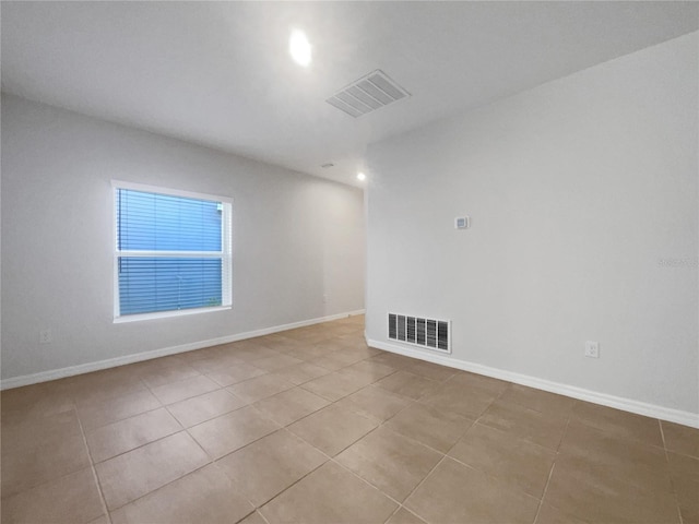 view of tiled spare room