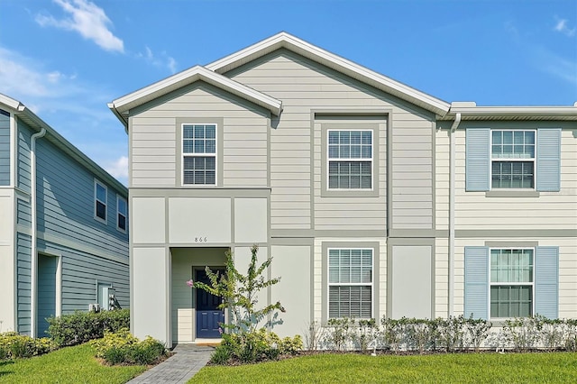 view of front facade with a front yard