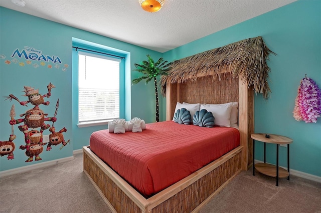 bedroom with carpet and a textured ceiling