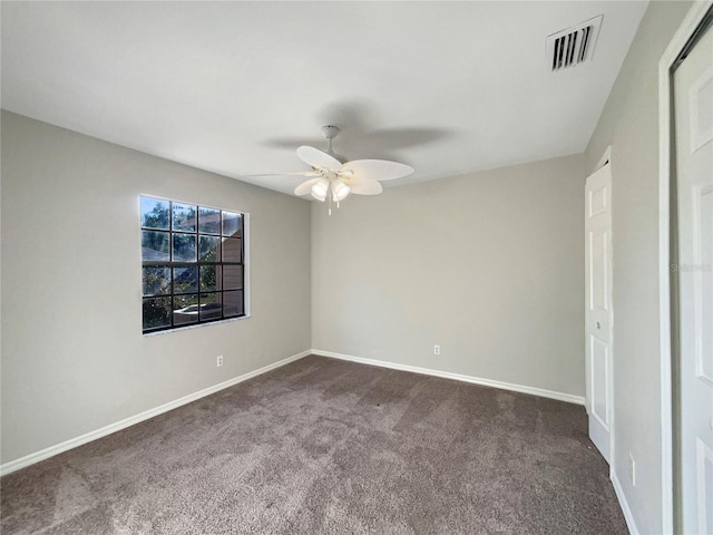 unfurnished bedroom featuring ceiling fan and carpet