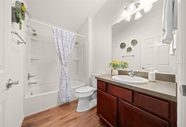 full bathroom with wood-type flooring, vanity, toilet, and shower / bathtub combination with curtain