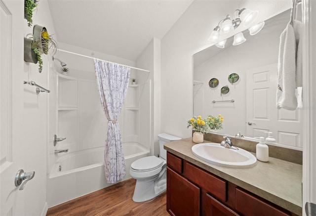 full bathroom featuring vanity, hardwood / wood-style flooring, toilet, and shower / bath combo with shower curtain