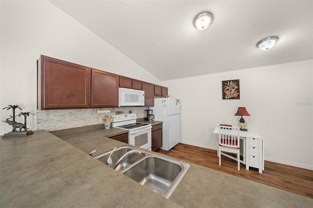 kitchen with sink, wood-type flooring, vaulted ceiling, a textured ceiling, and white appliances