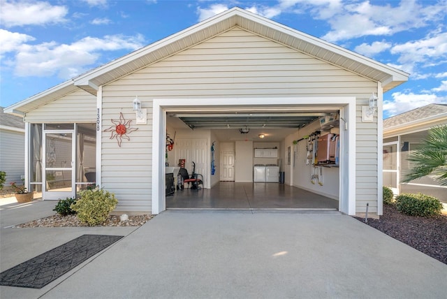 garage featuring washer and dryer