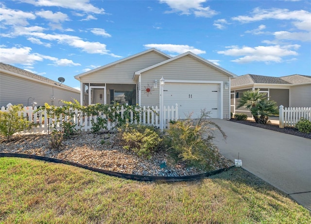 ranch-style home with a garage