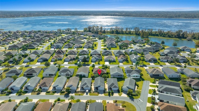 drone / aerial view with a water view