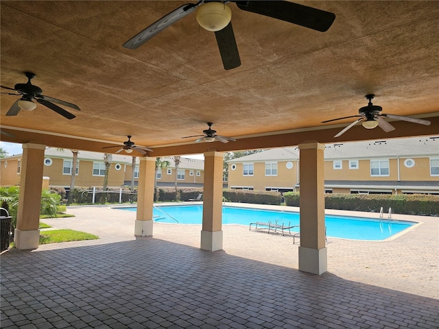 view of swimming pool with a patio