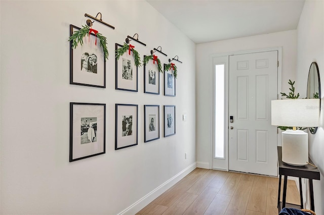 foyer with light hardwood / wood-style flooring