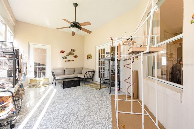 interior space with ceiling fan and french doors